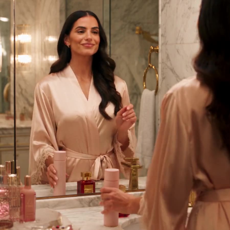 AscendAura body cleanser in a marble bathroom